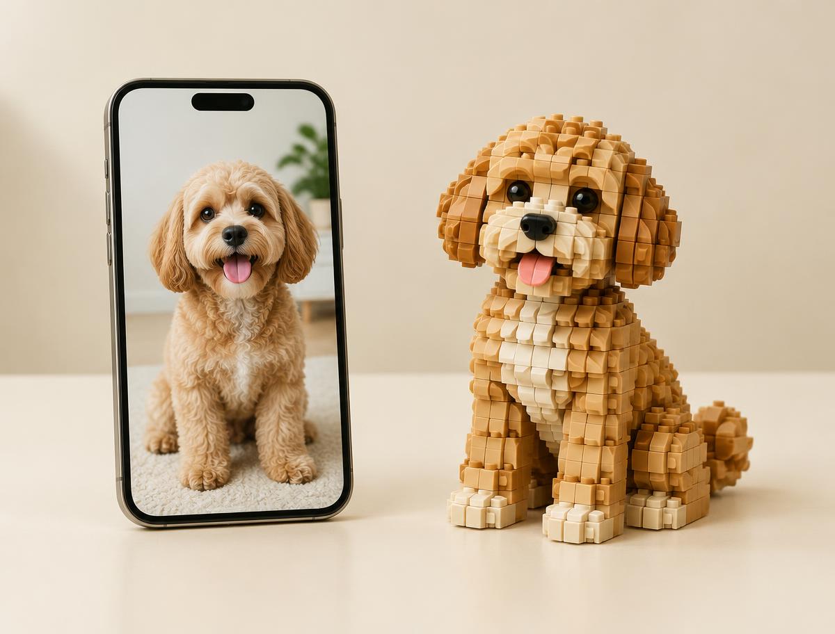 A dog photo on a phone next to the same dog built in bricks